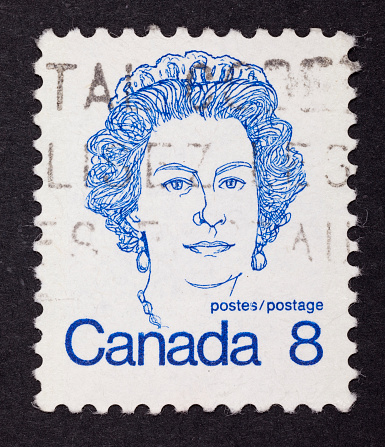 Istanbul, Turkey - December 17, 2011 : Close-up postage stamp on black background. Canada postage stamp with Queen elizabeth II