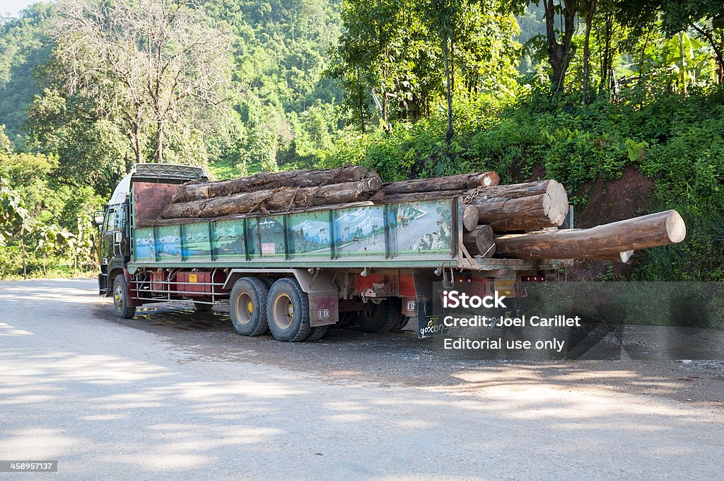 Logging in Myanmar Kalaw, Myanmar - October 31, 2011: A logging truck parked on the side of the road several miles outside the town of Kalaw. Myanmar Stock Photo