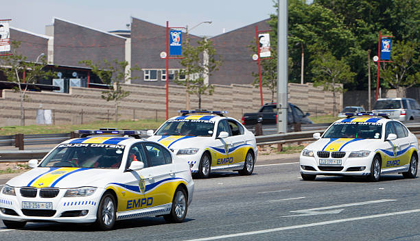 Johannesburg, South Africa - November 27th, 2011:  Three metro police vehicles seen here on the highway, escorting motorcyclists that will follow behind. The toyrun is a yearly charity event held by motorcyclists.
