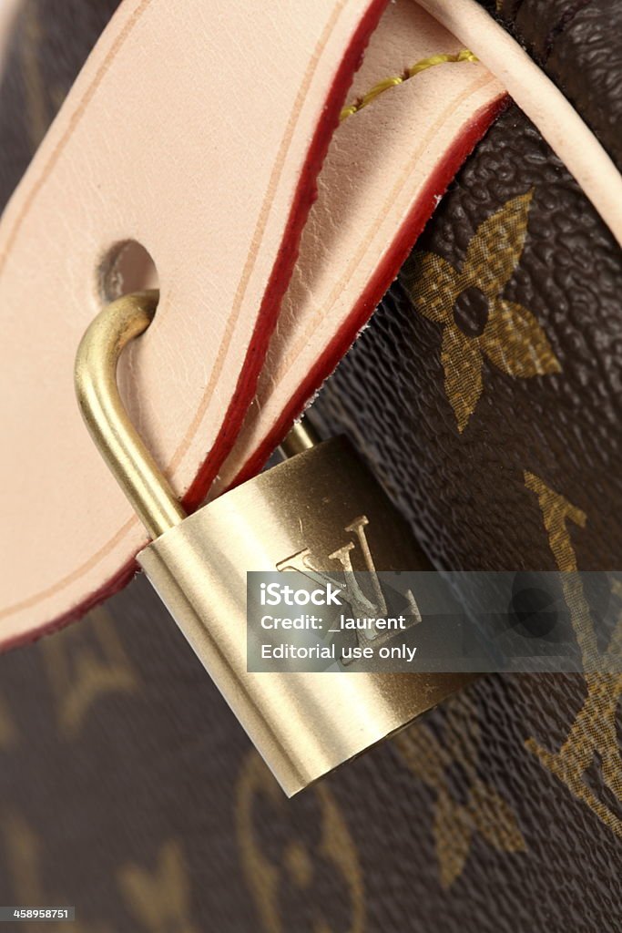 Louis Vuitton Padlock Stock Photo - Download Image Now - Louis Vuitton -  Designer Label, Luggage, Purse - iStock