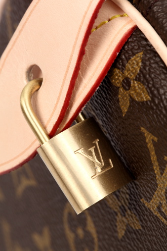 Louis Vuitton Padlock Stock Photo - Download Image Now - Louis Vuitton -  Designer Label, Luggage, Purse - iStock
