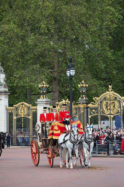 Queens Carriage "London, England - June 16, 2012: Horse drawn carriage carrying the Queen of England leaves Buckingham Palace during Trooping the Colour" elizabeth i of england photos stock pictures, royalty-free photos & images