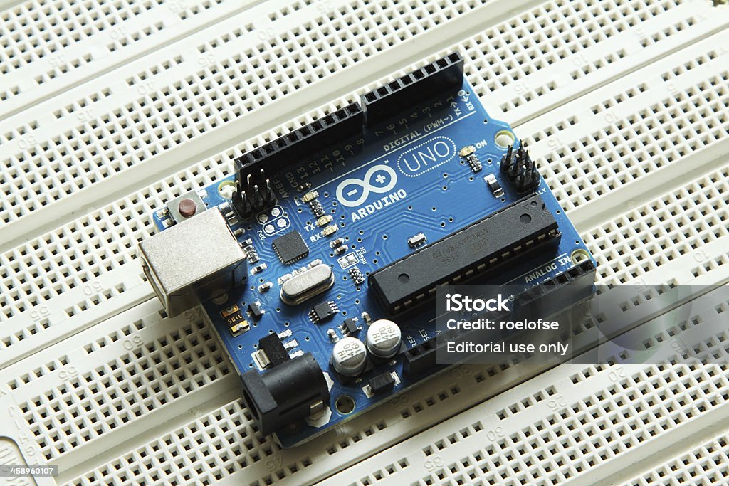 Arduino Uno Microcontroller Stock Photo - Download Image Now ...