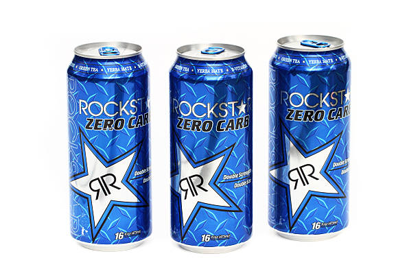 Rock Star energy dirnk "West Palm Beach, USA - February 9, 2012: This is a studio shot of three cans of Rock Star Zero Carb energy drink. Rock Star contains caffeine, ginseng, guarana and other herbs. It is one of the leading energy drink brands in the USA. Rock Star is made in many flavors and is produced by Rockstar Energy Drink Company." vitamin b 3 stock pictures, royalty-free photos & images