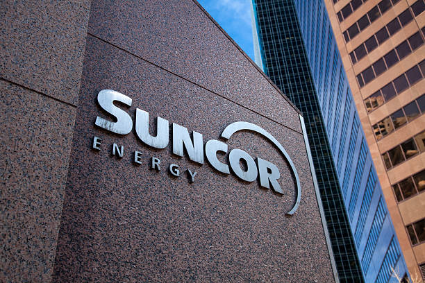 Suncor Energy "Calgary, Alberta - April 2, 2012: Suncor Energy's head office in Calgary Alberta. Suncor is one of the major developers of the Alberta Oilsands, as well as holding international developments in the North Sea, Libya, Syria, and Trinidad and Tobago." suncor alberta stock pictures, royalty-free photos & images