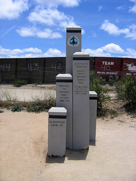 Southern Terminus of the Pacific Crest Trail "Campo, California, USA - May 18, 2010: A view of the monument at the southern terminus of the pacific crest trail at the US/Mexico border." pacific crest trail stock pictures, royalty-free photos & images