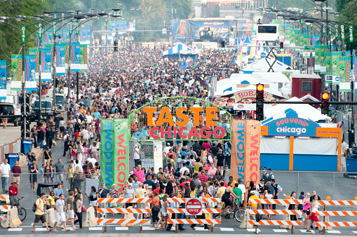 Chicago, USA - July 11, 2012: The entrance to the Taste of Chicago on the corner of Monroe and Columbus drive where patrons undergo a security check of bags by local police.