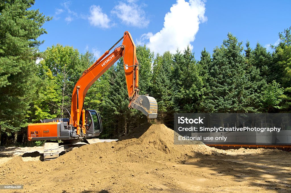 Excavator no local de construção de Casa - Royalty-free Ao Ar Livre Foto de stock