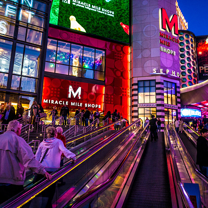 Las Vegas, USA - December 23, 2011 : View of the Miracle Mile Shops on The Strip (Las Vegas boulevard). It opened in 2007. One hundred and fifty shops and fifteen restaurants are part of this shopping complex. People are visible in this image.