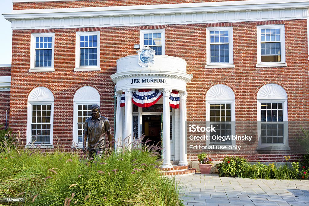 John Fitzgerald Kennedy Museum "Hyannis, USA  September 20, 2012: John Fitzgerald Kennedy Museum. The museum is in Hyannis, Cape cod, Massachusetts. Statue of JFK is in foreground." Cape Cod Stock Photo