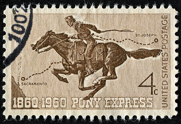 Pony Express Stamp "Richmond, Virginia, USA - November 27th, 2012:  Cancelled Stamp From The United States Commemorating The 100th Anniversary Of The Pony Express." pony photos stock pictures, royalty-free photos & images
