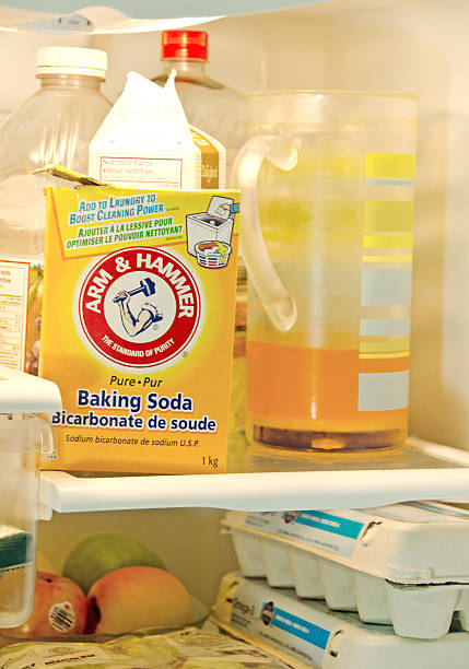 ręka i młot soda oczyszczona - arm & hammer baking soda box editorial zdjęcia i obrazy z banku zdjęć