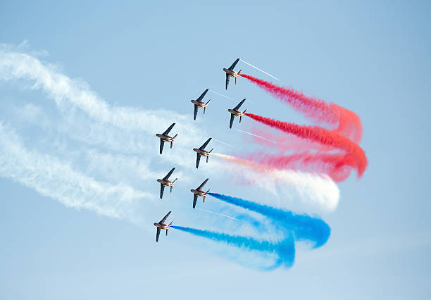 Patrouille de France aerobatic display team "Oslo, Norway - September 1, 2012: Patrouille de France aerobatic display team making vapor trails at an Airshow at Oslo harbor." aerobatics photos stock pictures, royalty-free photos & images