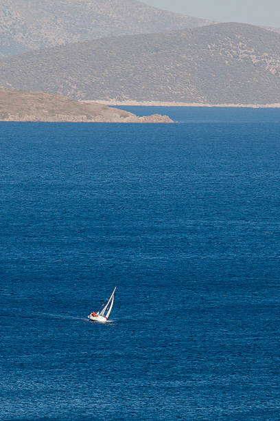 pequena vela barco à vela no mar egeu perto bodrum - sailing vertical lying on side lying down imagens e fotografias de stock