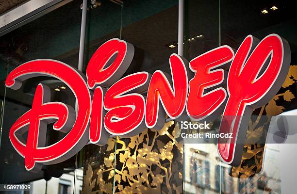 Disney Logo On Shop Window Stock Photo - Download Image Now - Disney, Walt Disney - Film Producer, Logo
