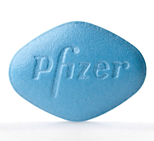 Viagra pill "Miami, USA - March 24, 2012: Viagra pill. Viagra is distributed by the pharmaceutical company Pfizer." pfizer stock pictures, royalty-free photos & images