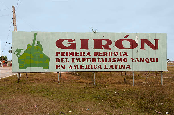 Battle of Playa Girón Playa Girón, Cuba, December 26, 2012. Poster commemorating the Battle of Playa Girón, in the Bay of Pigs, where the mercenary army, backed by the U.S., was defeated by the revolutionary army. The caption reads: Giron, first defeat of yanqui imperialism in Latin America. bay of pigs invasion stock pictures, royalty-free photos & images