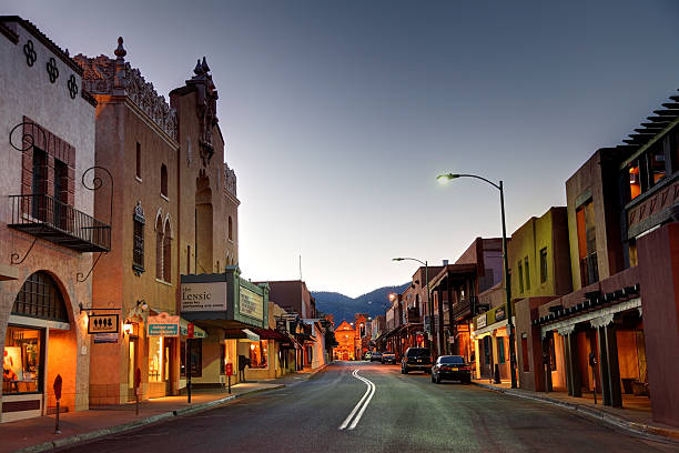 Santa Fe Santa Fe, New Mexico, USA - April 17, 2012: Road in the business district leading to the Cathedral Basilica of Saint Francis of Assisi at dawn. santa fe new mexico stock pictures, royalty-free photos & images