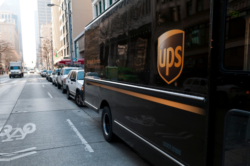 Seattle, WA, USA - March 23, 2012: A UPS delivery truck parked for delivery on a downtown city street early in the morning.