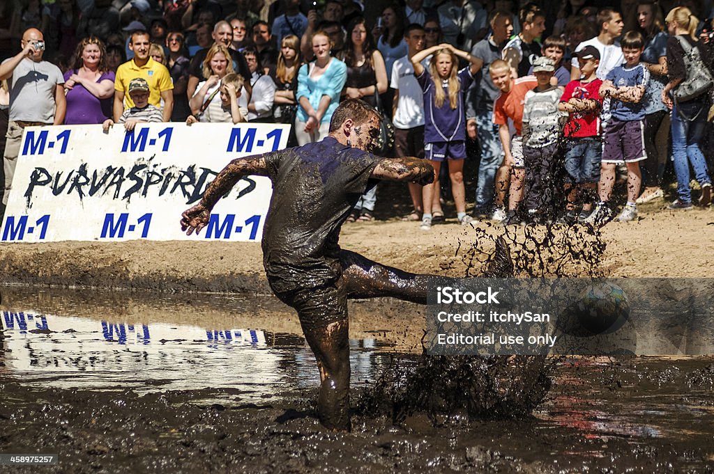 Fango Giocatore di football americano - Foto stock royalty-free di Acqua