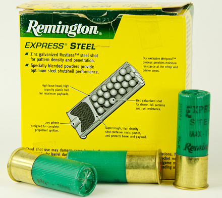 Bruce, Canada- February 26, 2012: A box of Remington steel shotgun shells. 12 gauge steel pellet hunting ammunition is used in place of the now illegal lead pellet shotgun ammunition.  Reminton Arms Company is based in Lonoke, Arkamsas.