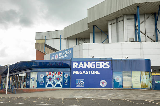 JJB Rangers Megastore at Ibrox Stadium, Glasgow "Glasgow, UK - July 21, 2012: The JJB Rangers F.C. Megastore at Ibrox Stadium, the official retail outlet for Glasgow Rangers Football Club at Ibrox Stadium, Glasgow." ibrox stock pictures, royalty-free photos & images