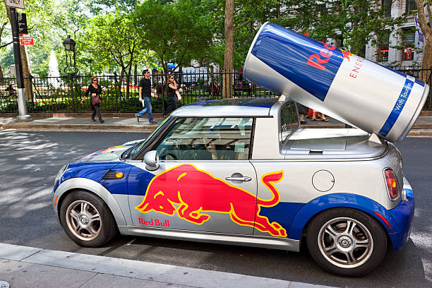 New York City "New York City, US - June 7, 2012: Redbull logo designed BMW Mini Cooper car parked in downtown Manhattan." red bull mini stock pictures, royalty-free photos & images