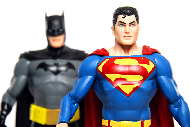 Partners in Crime Fighting "Vancouver, Canada - April 24, 2012:  Action figure models of Superman and Batman, sculpted by Paul Harding and released by DC comics, against a white background." action figure stock pictures, royalty-free photos & images