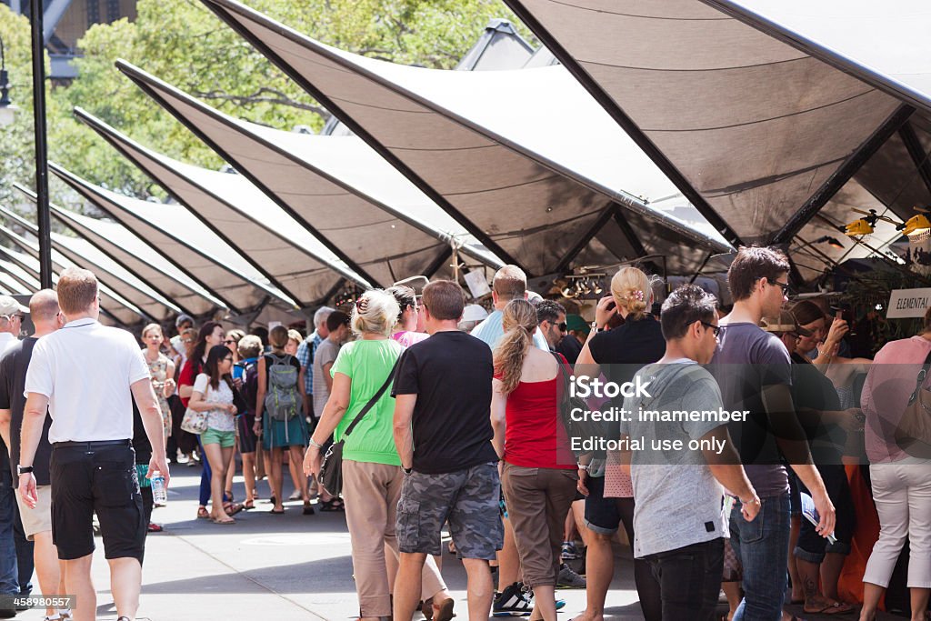 The Rocks market Sydney, Australia - March 09, 2013: The Rocks is best known and most creative market in Sydney. Big crowd enjoying sunny day at the Rocks market with plenty of stalls and big variety of things to buy. Market - Retail Space Stock Photo