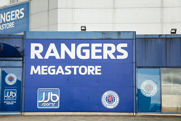 JJB Rangers Megastore at Ibrox Stadium, Glasgow "Glasgow, UK - July 21, 2012: The JJB Rangers F.C. Megastore at Ibrox Stadium, the official retail outlet for Glasgow Rangers Football Club at Ibrox Stadium, Glasgow." ibrox stock pictures, royalty-free photos & images