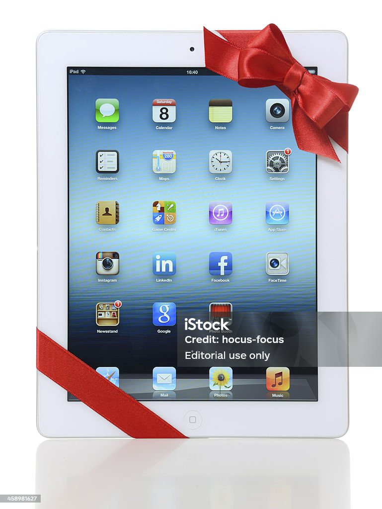 iPad 3 avec un ruban rouge - Photo de Anniversaire libre de droits