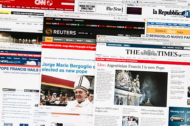 Most important newspapers headlines after the new Pope election "Florence, Italy - March 13, 2013: Close up of an LCD screen with of the most important newspapers headlines after the new Pope election, Francesco 1st. The most important newspapers headlines showed are : La repubblica, the new york times,Reuters, bbc, cnn . Studio shot. The new Pope is the argentina's Jorge Mario Bergoglio, archbishop of Buenos Aires." bbc photos stock pictures, royalty-free photos & images