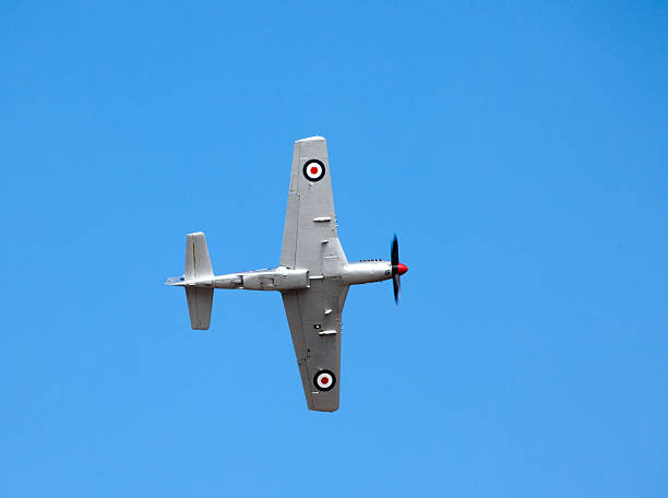 Omaka Air Show, Blenheim, New Zealand "Blenheim, New Zealand - March 30th, 2013: Photo of North American P-51 Mustang, was built to help the British out during the war and performed very well at low altitude. They have been used post war in a number of countries around the world, including the Dominican Republic operating as late as 1984." oxygen mask plane stock pictures, royalty-free photos & images