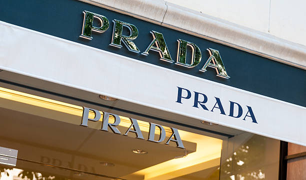 Paris, France - May 14, 2012: Prada shop in rue Montaigne. This street is consider th emost important rue of Paris regarding high fashion and accessories and boasts numerous stores specialized in dresses, jewelry, and other upscale establishments.