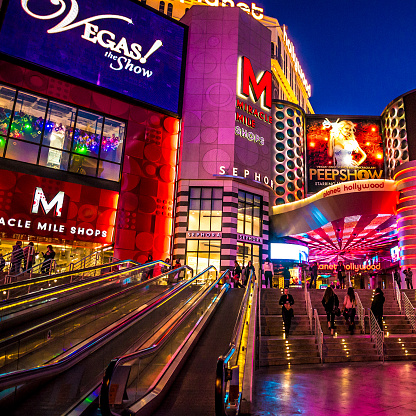 Las Vegas, USA - December 23, 2011 : A view at Miracle Mile Shops on The Strip (Las Vegas boulevard). It opened in 2007. One hundred and fifty shops and fifteen restaurants are part of this shopping complex. People are visible in this image.