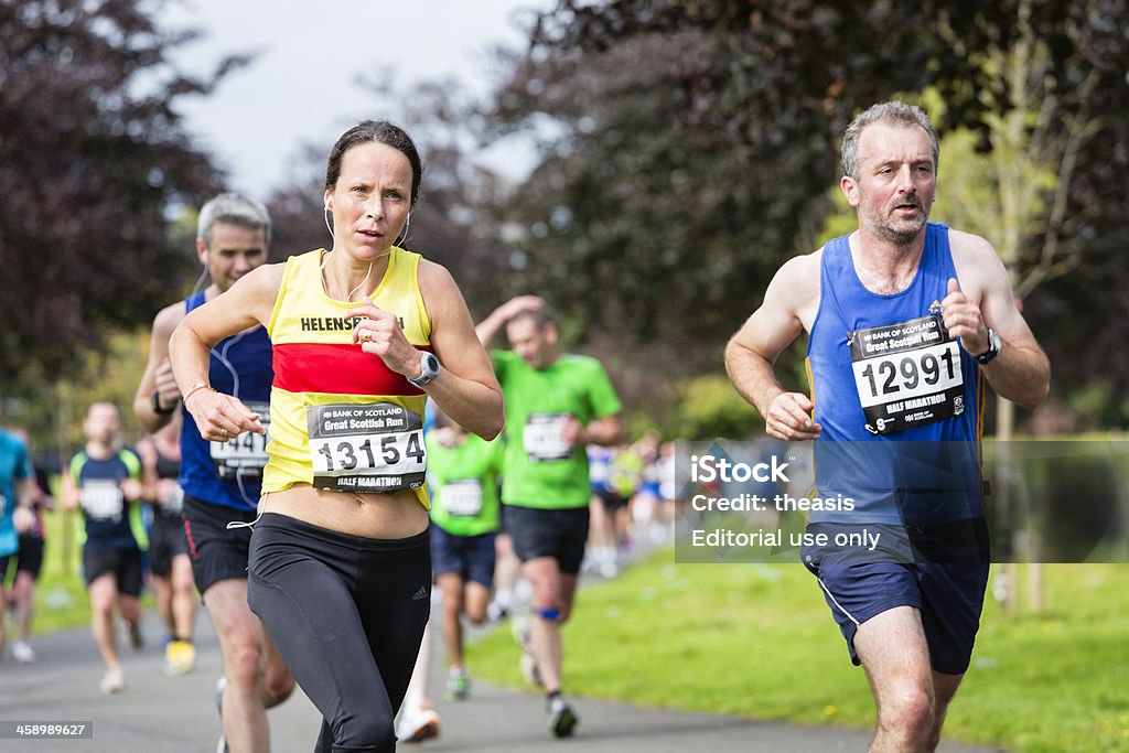 Mezza maratona corridori - Foto stock royalty-free di Adulto