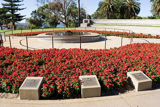 Kings Park Memorial "Perth, Australia - January 30th, 2013. An eternal flame burns at the Kings Park War Memorial at Kings Park. The flame was taken from the Australian War Memorial in the year 2000." kings park stock pictures, royalty-free photos & images