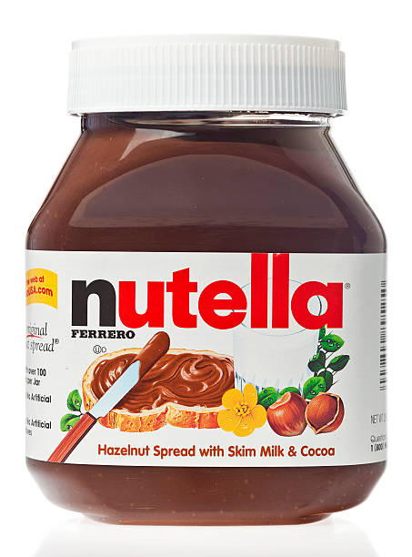 nutella nocciola diffusione - nutella foto e immagini stock