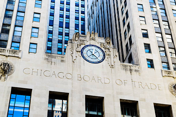 Chicago Board of Trade Clock "Chicago, USA - February 24, 2013: Chicago Board of Trade Clock in The Loop, downtown Chicago. Architecural detail. Art Deco landmark building, built 1930.  No people." 20th century style stock pictures, royalty-free photos & images