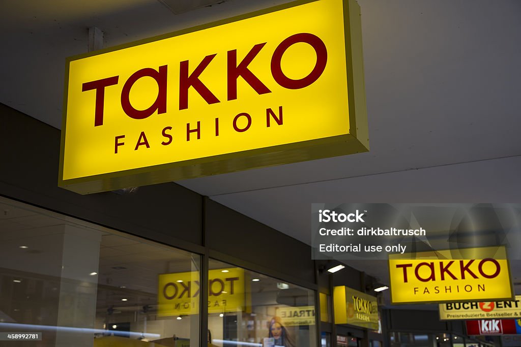 Rijke man Ontembare Chaise longue Illuminated Advertising Of Takko Fashion Store Stock Photo - Download Image  Now - Architectural Feature, Beauty, Chemnitz - iStock