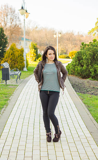 istock Young pretty woman standing on alley 458993193