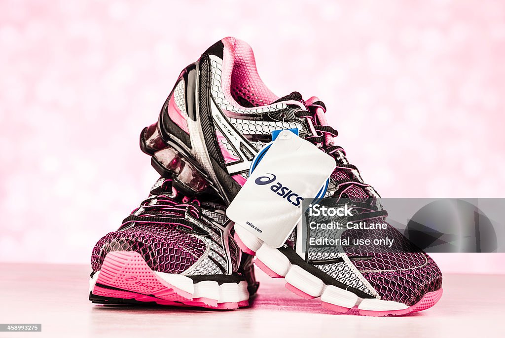 Asics Gel-Kinsei 4 Women's Sports Shoes "Suffolk, Virginia, USA - October 26, 2012: A horizontal studio shot of a brand new pair of Asics women's engineered sports shoes with the original label attached. This model is the Gel-Kinsei 4 in color version black, white and neon pink." Beauty Stock Photo