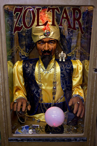 Zoltar Fortune Teller Machine Deadwood, South Dakota, United States - March 9, 2012. Zoltar Fortune Teller Machine in small town store. Made famous by the movie "Big", it has been parodied many times and is quite prominent now in popular culture. fortune telling machine stock pictures, royalty-free photos & images