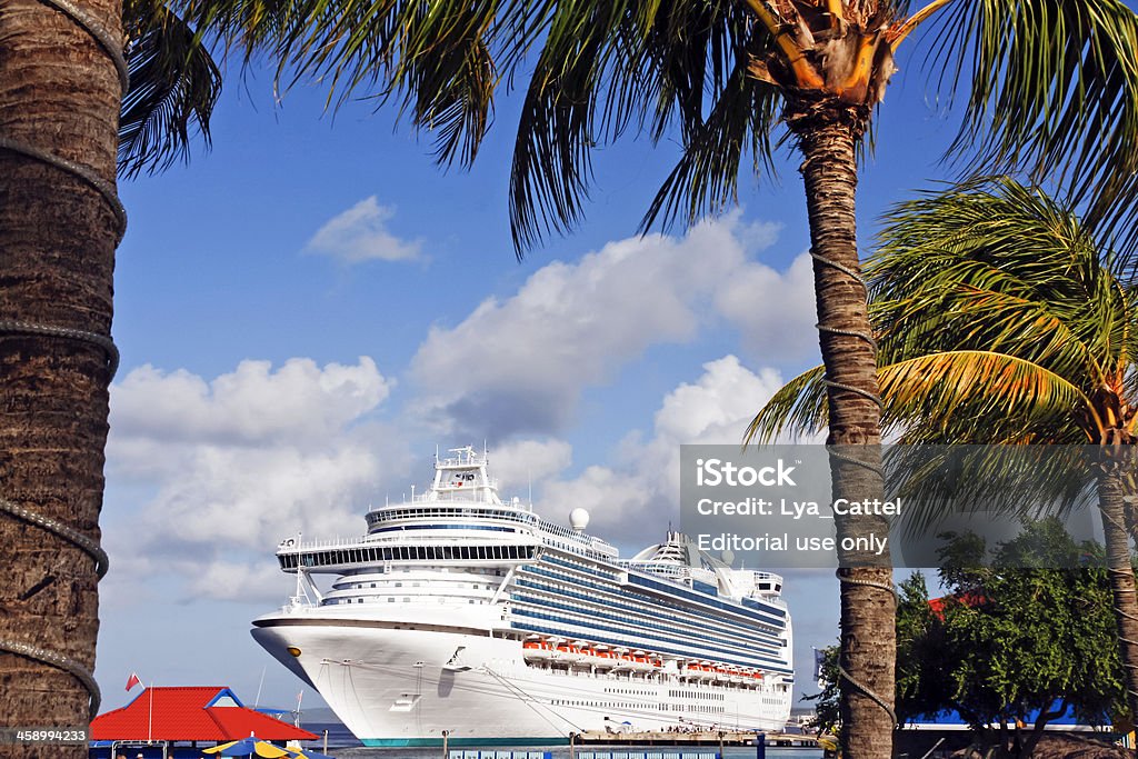 Cruise ship # 8 "Kralendijk, Netherlands Antilles - November 20, 2007: International cruise ship Emerald Princess from Princess Cruises, anchored at Kralendijk the capital and largest city of the island Bonaire." Cruise Ship Stock Photo