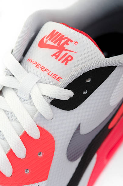 spijsvertering zeil Penetratie Close Up Of Nike Air Logo On Trainer Tongue Stock Photo - Download Image  Now - Nike - Designer Label, Jogging, Shoe - iStock