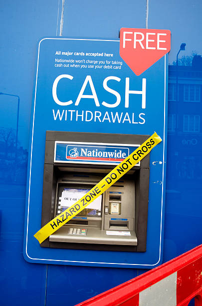 cash machine pericolo avvertenza - nationwide foto e immagini stock