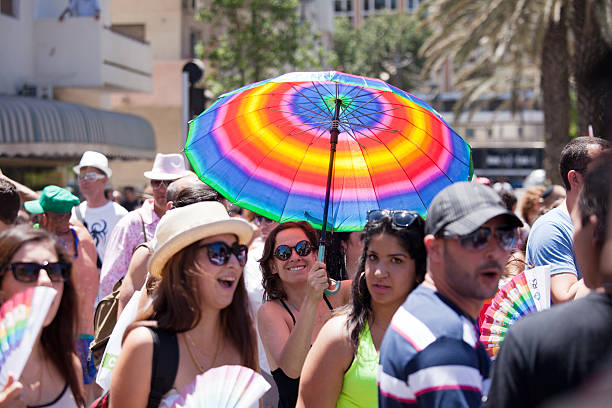 Madrid, Spain - July 05, 2025  in Madrid, Gay pride day celebrations.\nPeople dressed in colorful costumes at the Gay Pride Parade . Participants in the annual event for the human rights protection and civil equality.