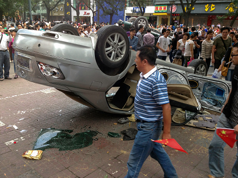 October 6, 2021, Riga, Latvia, damaged car and motorbike on the city road at the scene of an accident because of non-observance of distance