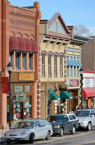 Ornate cast metal cornice adorns brick building
