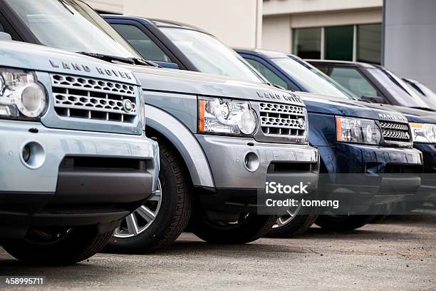 New Land Rover Vehicles In A Row Stock Photo - Download Image Now - Land Rover, Range Rover, Car Dealership